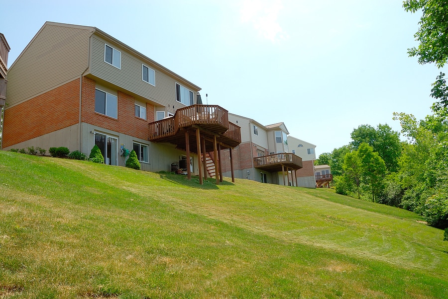 Deck or Patio for a Sloped Backyard?